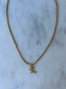 Initial letter in gold link chain