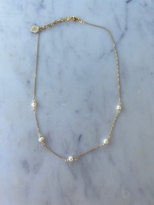 Dainty gold pearl necklace