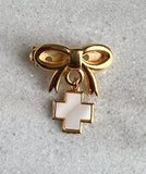 Gold religious pin
